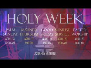 A man stands at a podium behind a listing of Holy Week events with dates and times, including Palm Sunday, Maundy Thursday, Good Friday, Sunrise Service, and Easter Worship.